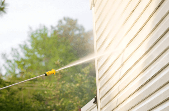 power wash siding on home